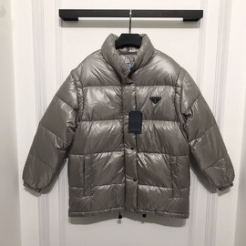 Женский пуховик Prada серый