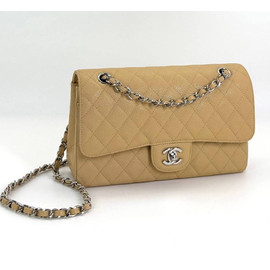 Кожаная сумка Chanel 11.12 Medium Classic Flap Bag Caviar бежевая
