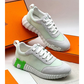 Белые с зеленым кроссовки Hermes Bouncing
