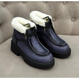 Женские кожаные синие ботинки с мехом Miu Miu