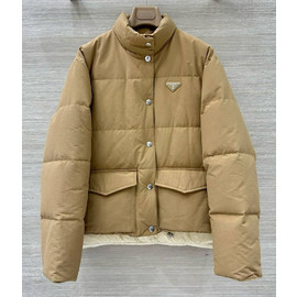 Женский бежевый пуховик Prada