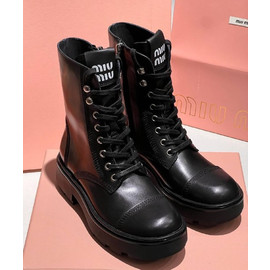 Женские черные кожаные высокие ботинки Miu Miu
