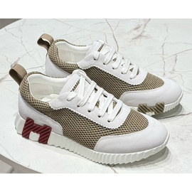 Женские бежевые с белым кроссовки Hermes Bouncing