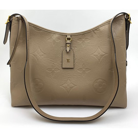 Женская бежевая сумка Louis Vuitton Carry All MM