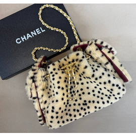 Кожаная сумка с мехом Chanel 25 Mini
