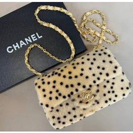 Кожаная сумка с мехом Chanel 11.12 Mini Flap Bag