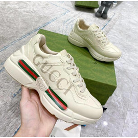 Женские кожаные кроссовки Gucci Rhyton